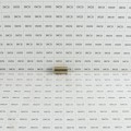 Linear / Osco 2200-964 Gate Plate Tube Spacer (Grid Shown For Scale)